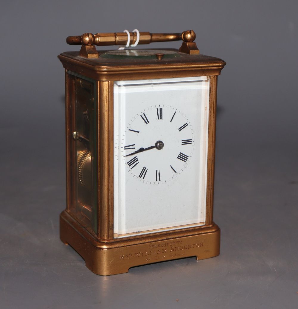 An early 20th century lacquered brass carriage timepiece, height 12cm